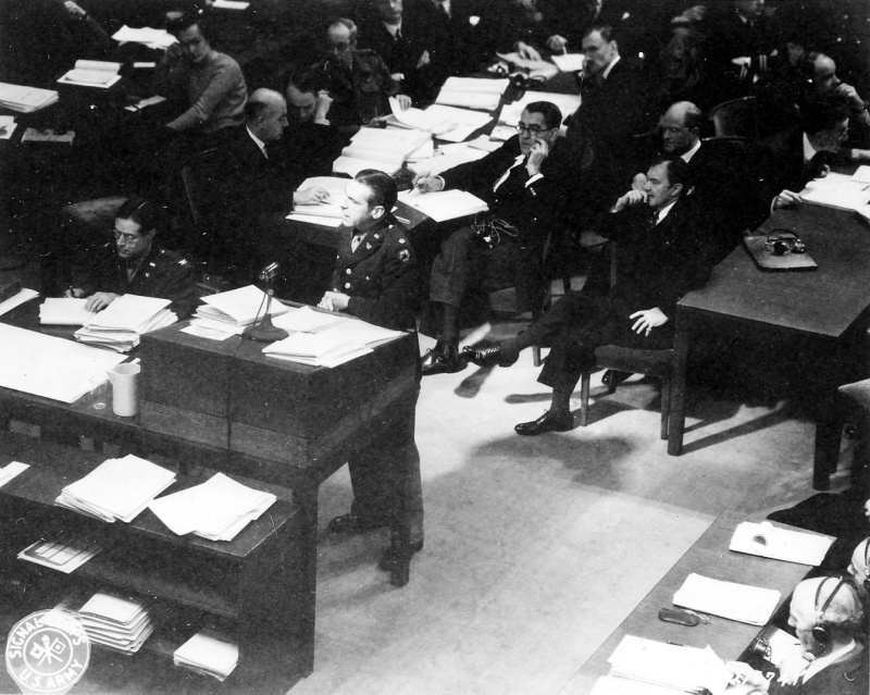 The prosecution adds documents to the evidence during a trial in Nurnberg, Germany. Courtesy of National Archives and Records Administration (NAID: 350375654).