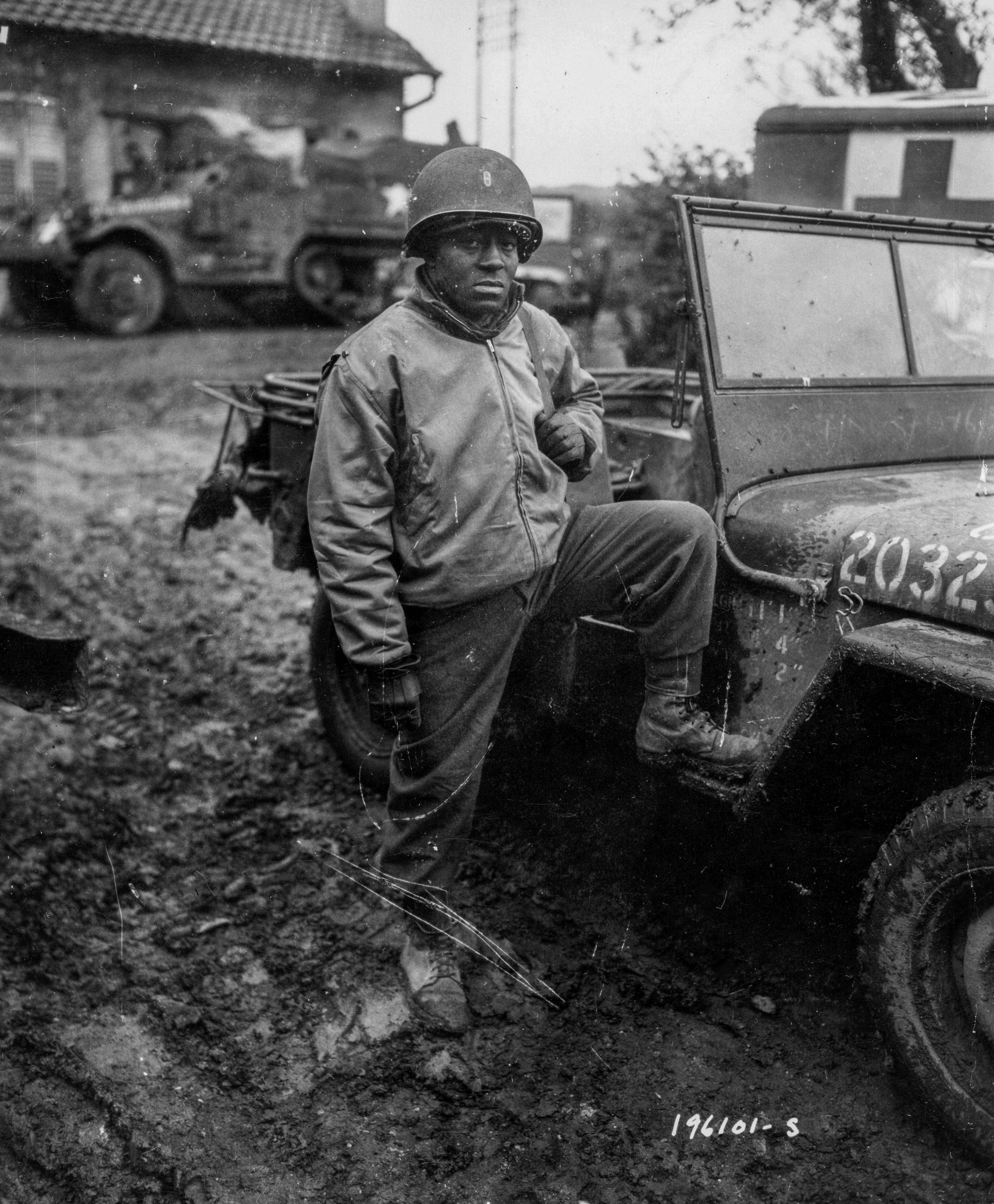 Historical image showing WOJO Clarence I. Godbold, Yonkers, N.Y., is personnel officer of a Motor Transport unit near Nancy, France. of Black American soldiers during WWII