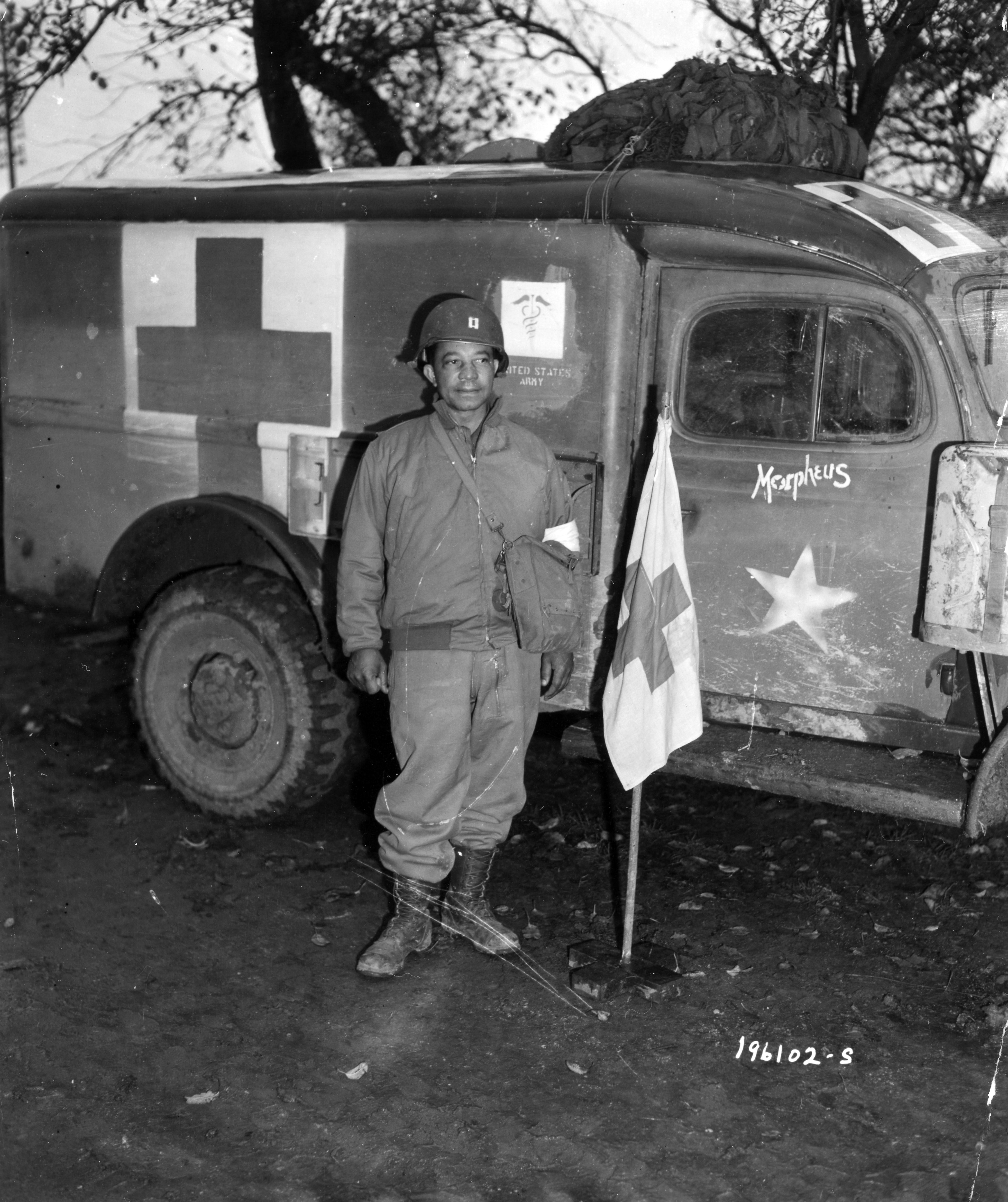 Historical image showing Capt. Garland N. Adamson, Chicago, Ill., is unit surgeon of an outfit near Nancy, France. of Black American soldiers during WWII